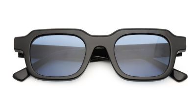 Acetate sunglasses with black, thick frames and a mix of square and round shapes with studs for an industrial style. (2).jpg