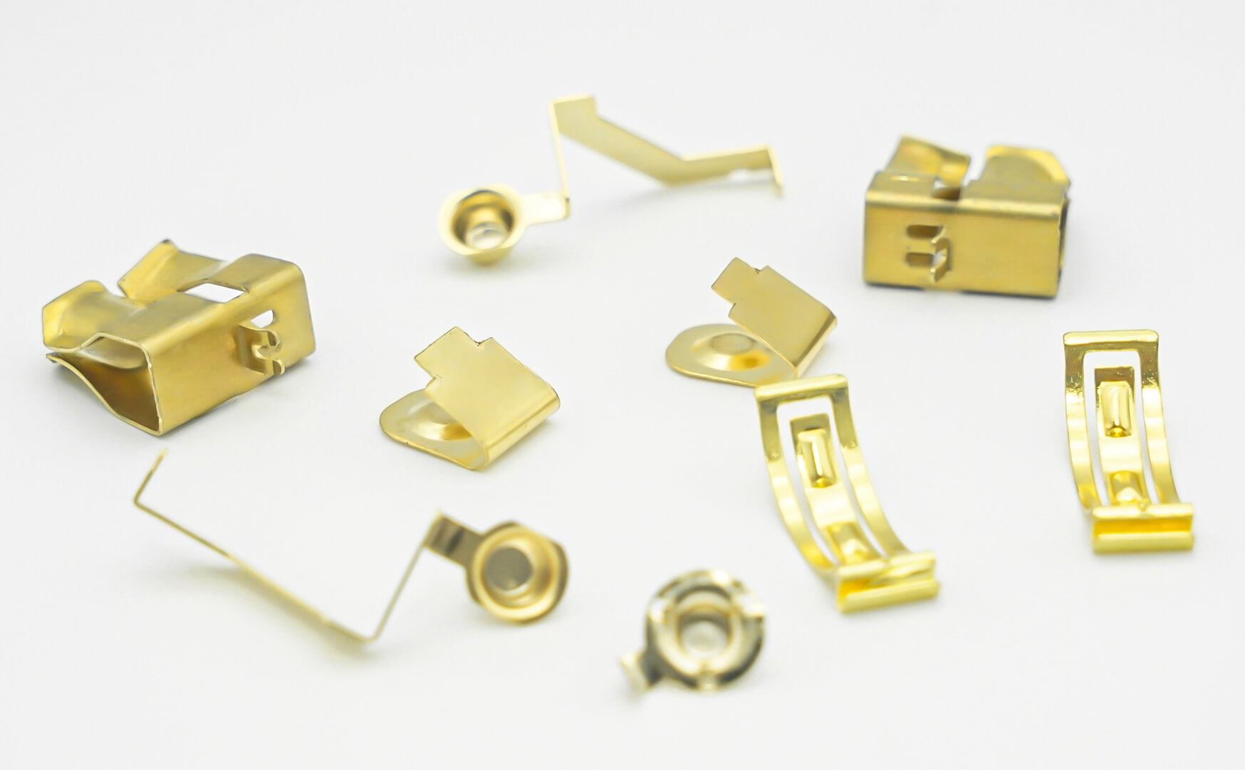 Electronic contact pieces: Commonly used in connectors, switches, and sensors. For example: SIM card contacts and battery spring pieces.