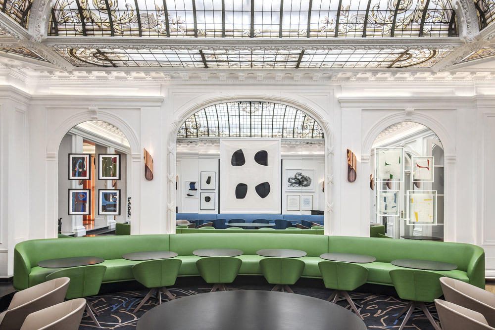 Furniture designer works custom hotel furniture...