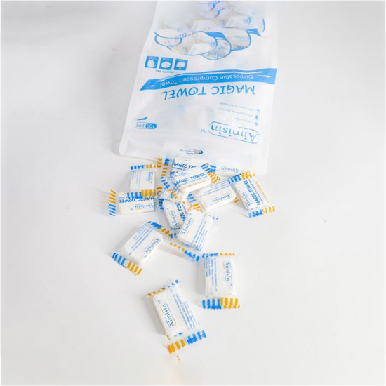 Stlačený kouzelný ručník Aimisin