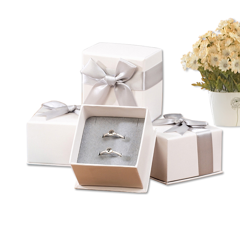 XY0126  High-end V cut edge leatherette cardboard jewelry box with ribbon tie