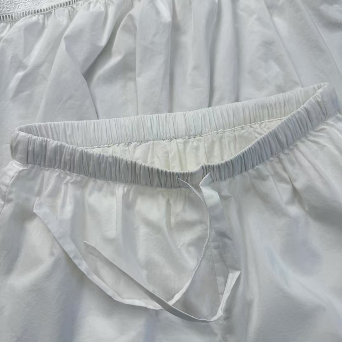Ethereal White Organic Cotton Shorts with Lace Trim Sustainable Resort Wear OEMODM (4).jpg