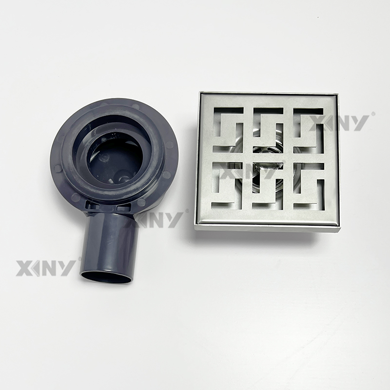 Desagüe de piso de acero inoxidable cepillado de estilo moderno de 4 pulgadas con aleta antiolor para baño, cocina y ducha.