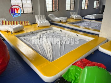 Yellow Floating Pool with Lounge Chairs