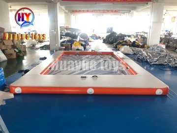 Orange and White Inflatable Floating Pool
