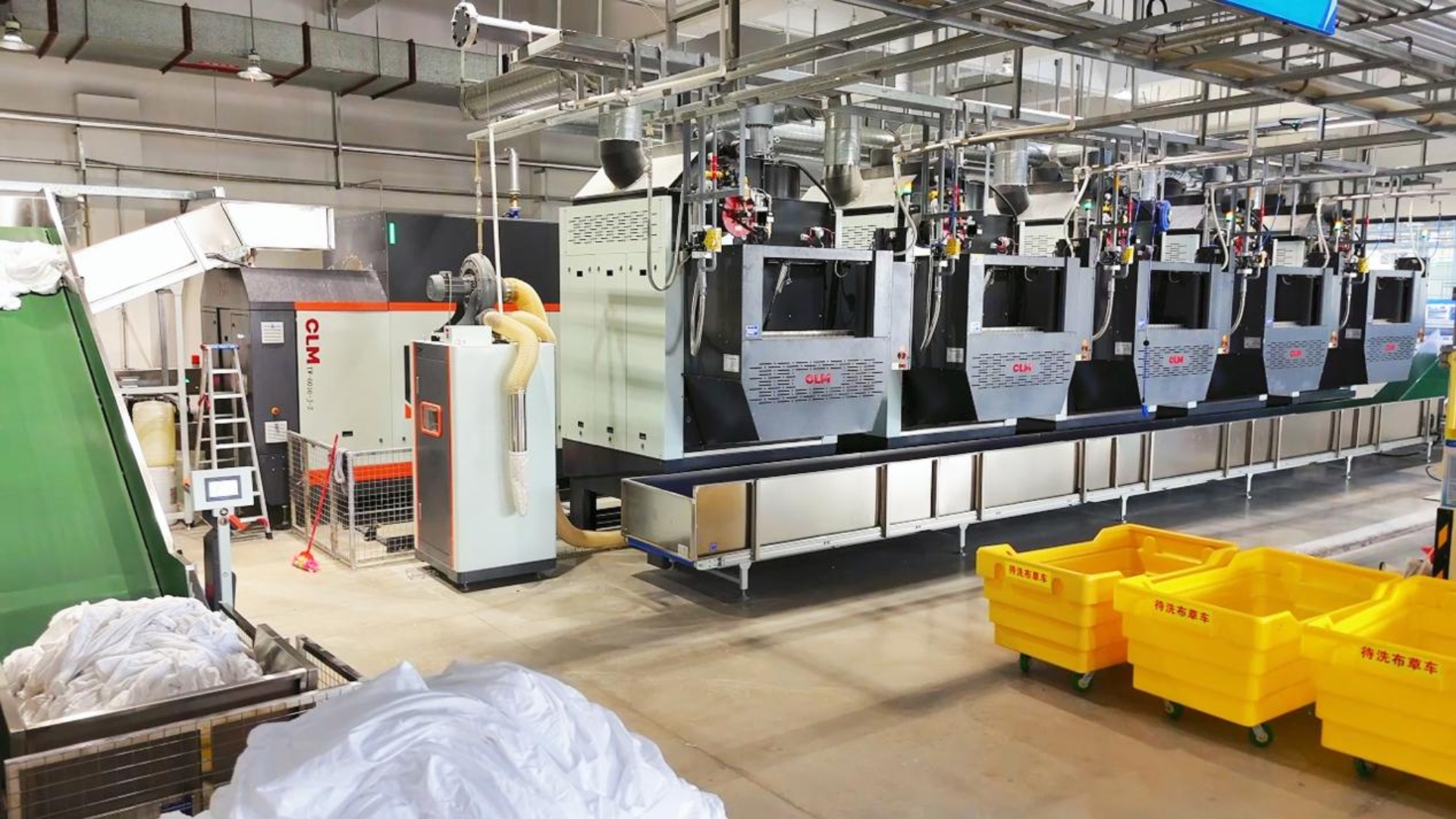 tunnel washer in linen laundry factory.jpg