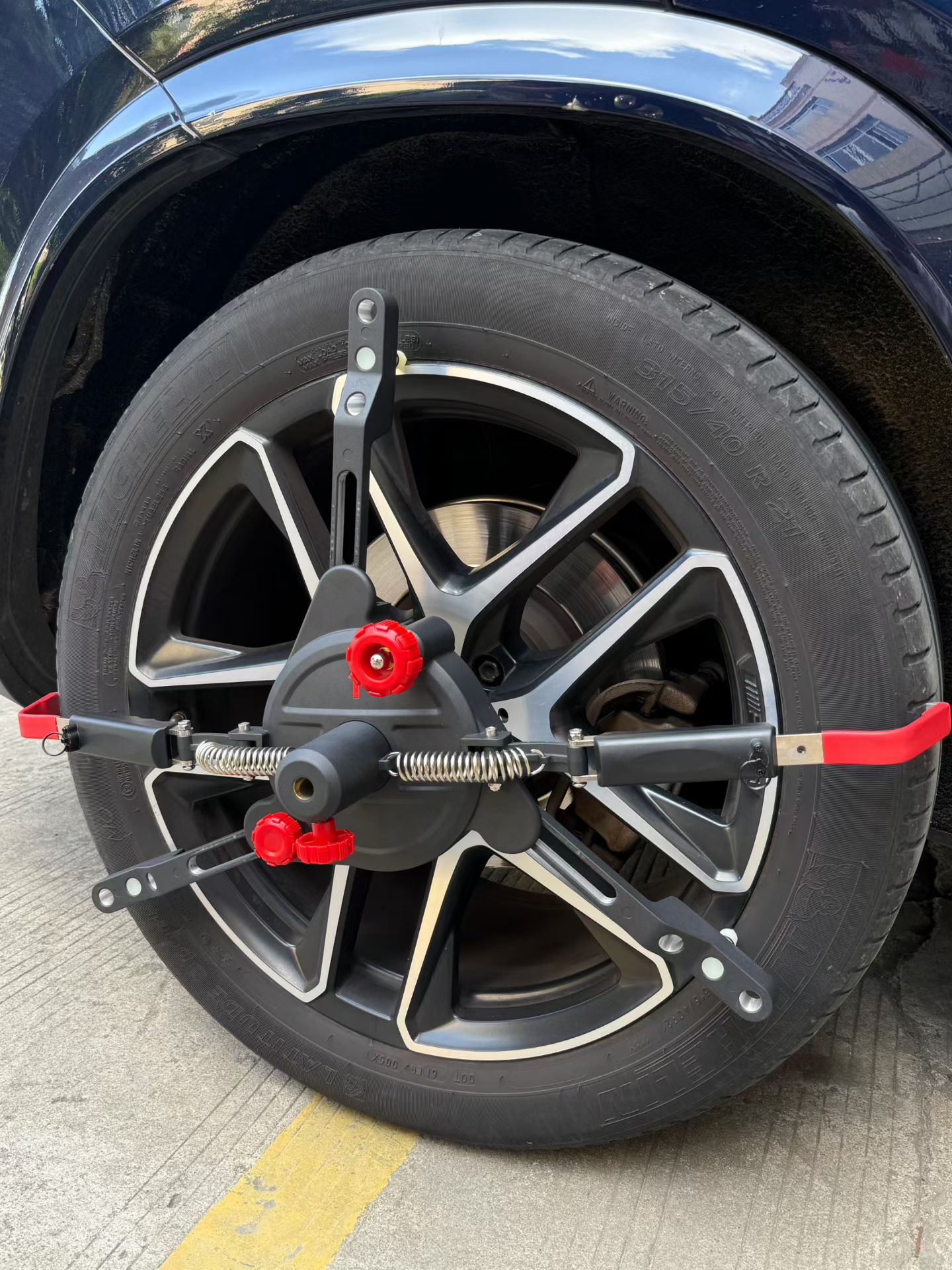 battle-axe tire gripping wheel alignment quick clamps adptors.jpg