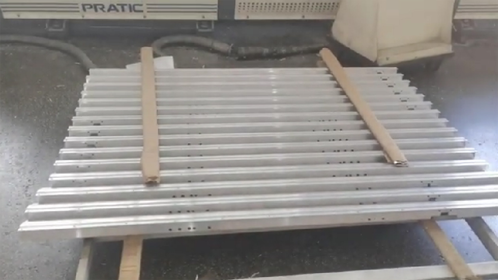 CNC milling machine is handling aluminum extrusions