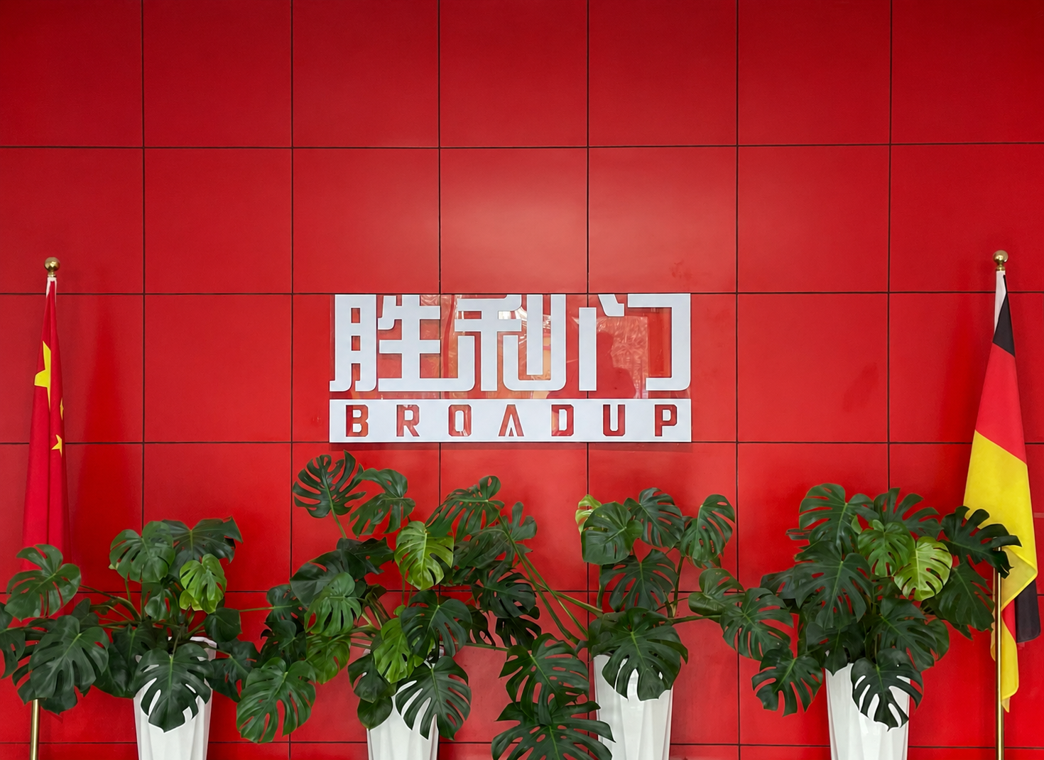 BROADUP Victory Door brand wall at industrial door company reception area
