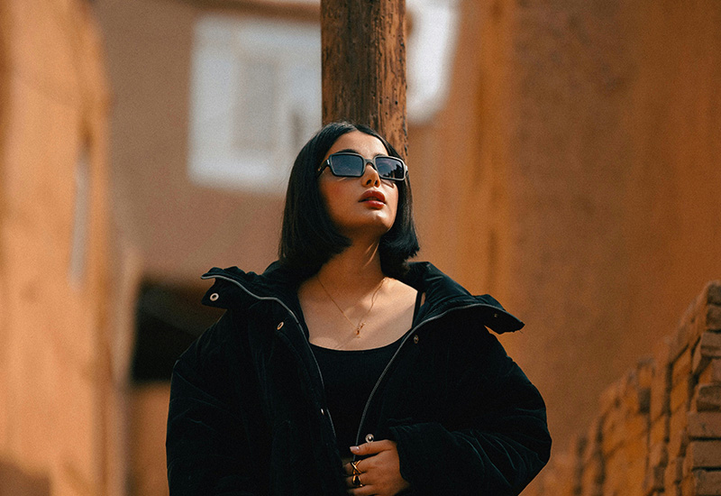 woman with photochromic prescription glasses.jpg