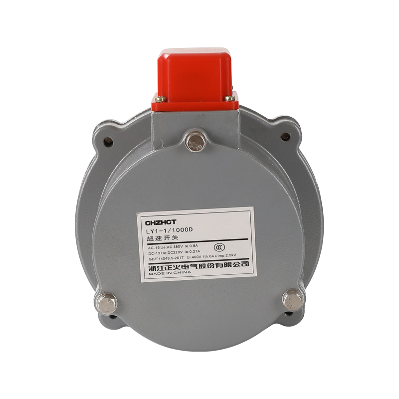 What is the difference between an overspeed switch and a travel switch?