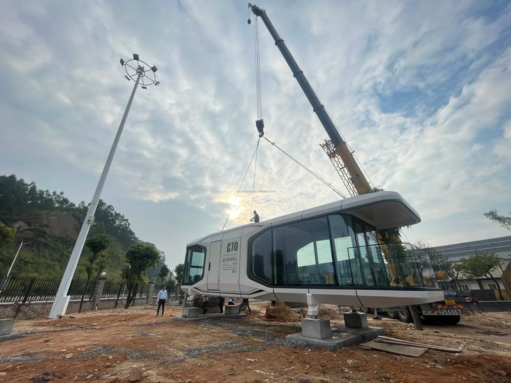 Feichen Building Revolutionizes Capsule House Shipping with Enhanced Packaging and Transportation Methods