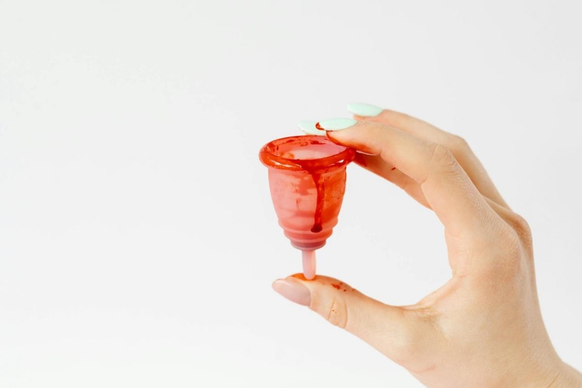 Can a menstrual cup damage the cervix or hold blood clots?