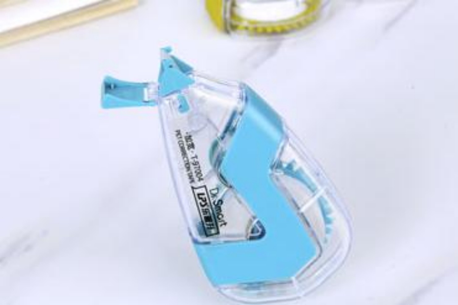 Correction Tape with Integrated Cap