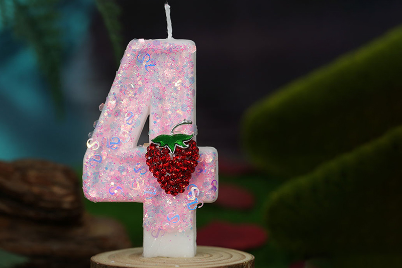 Creative light pink strawberries adorn digital birthday candle