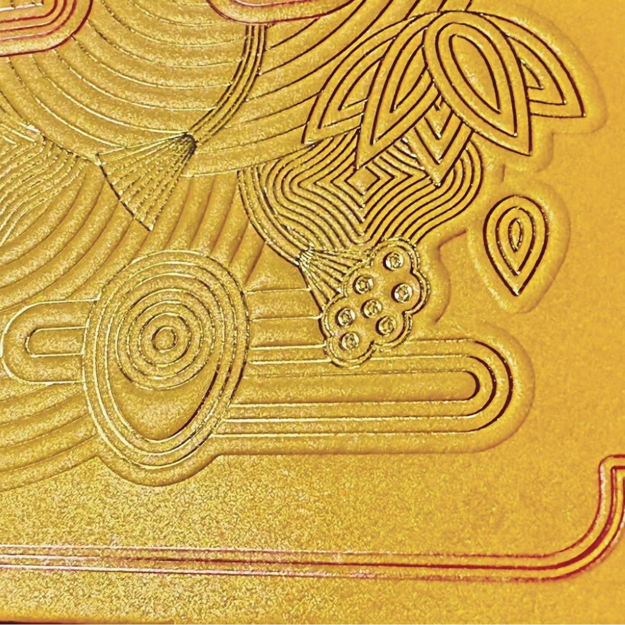 Rimmed and gold-embossed
