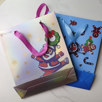 Santa & Gingerbread Man Holographic Christmas Paper Bags with Decorative Handles E-Commerce Bests...