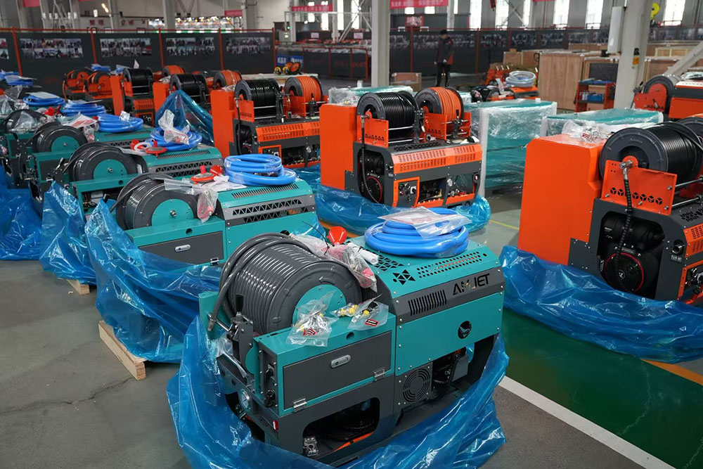AMJET sewer jetter machines prepared for international shipment.jpg