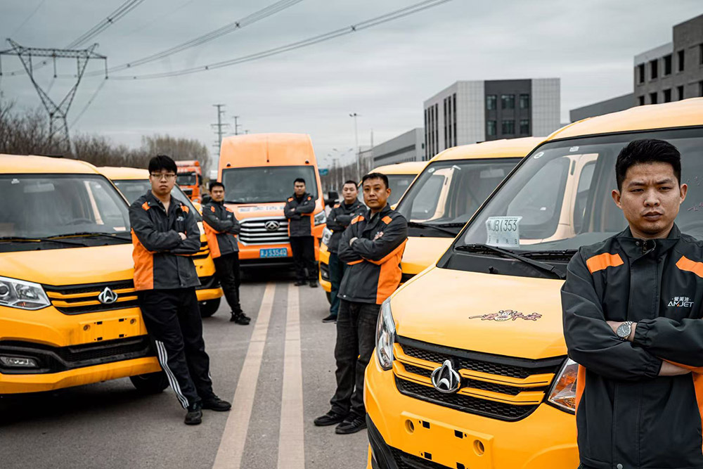 Amjet pipeline cleaning team with service vehicles.jpg