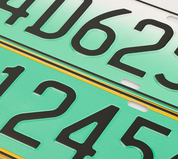 Coloring the protruding parts such as characters and borders of motor vehicle license plates2