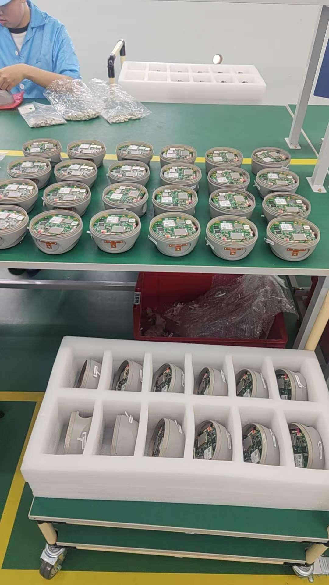 Batch assembly of internal GNSS OEM processing boards into lower receiver housings on the factory line