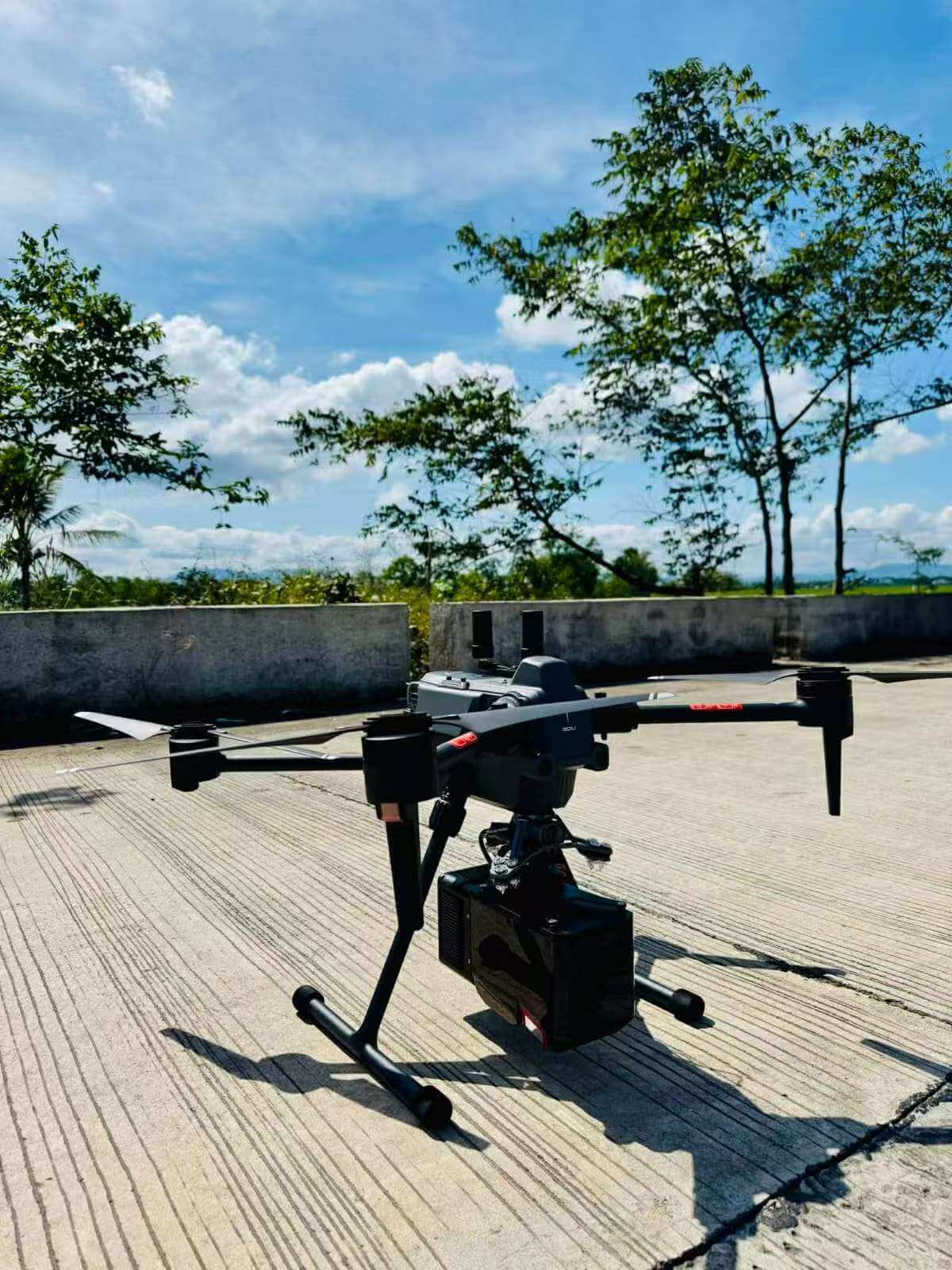 DJI Matrice enterprise drone equipped with an aerial LiDAR sensor for high-precision topographic mapping using RTK base corrections