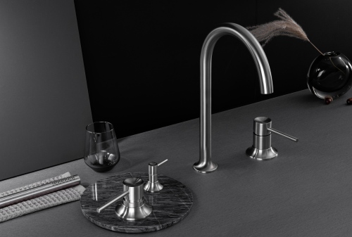 304 stainless steel faucet OEM manufacturer installing pressure-compensating 1.5 GPM aerator on production flow bench.jpg