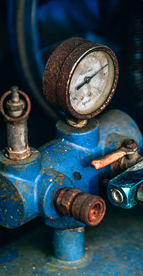 closeup-of-the-rusty-air-tank-pressure-gauge-blue-air-tank-with-air-compressor-pressure-gauge-with_t20_GgZvEo
