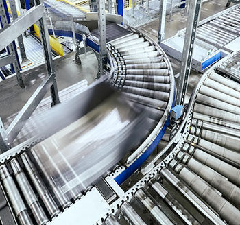 modern-conveyor-system-with-box-in-motion-2021-08-28-00-09-52-utc