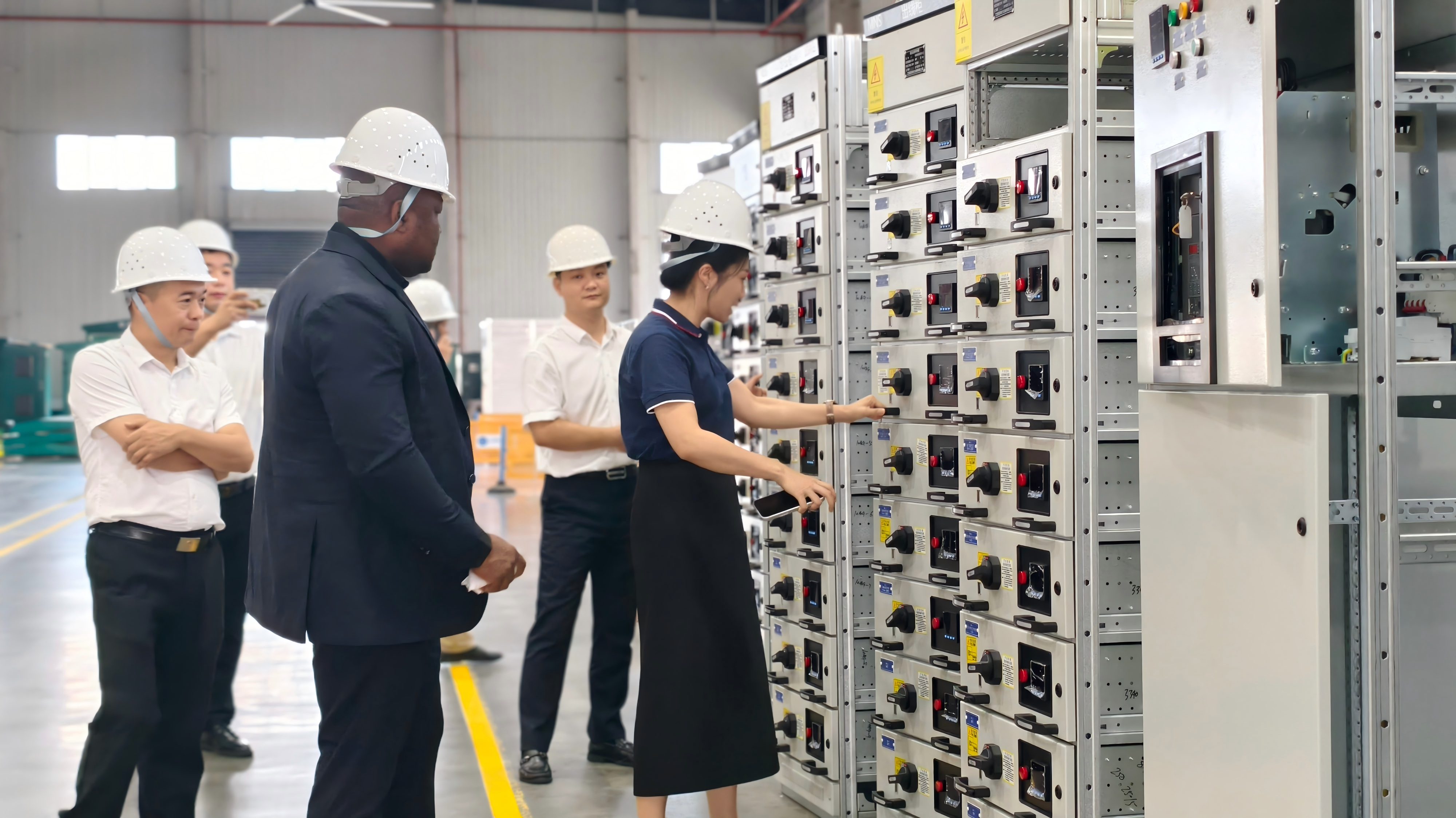 African Sumdawngte chuan Guoxiang Electric-a Technical & Business Team-te nen On‐Site Factory Inspection an tifel