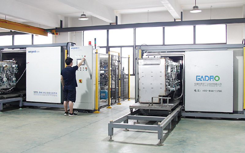 Vacuum box helium leak detection system