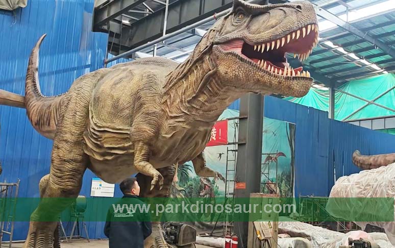 giant Trex model during final assembly and testing before shipment to Lugo