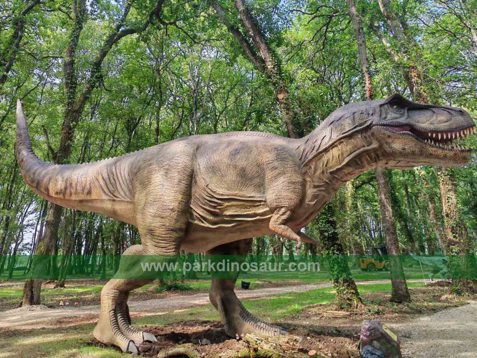 Large life-size dinosaur installed in a forest attraction in Lugo Spain