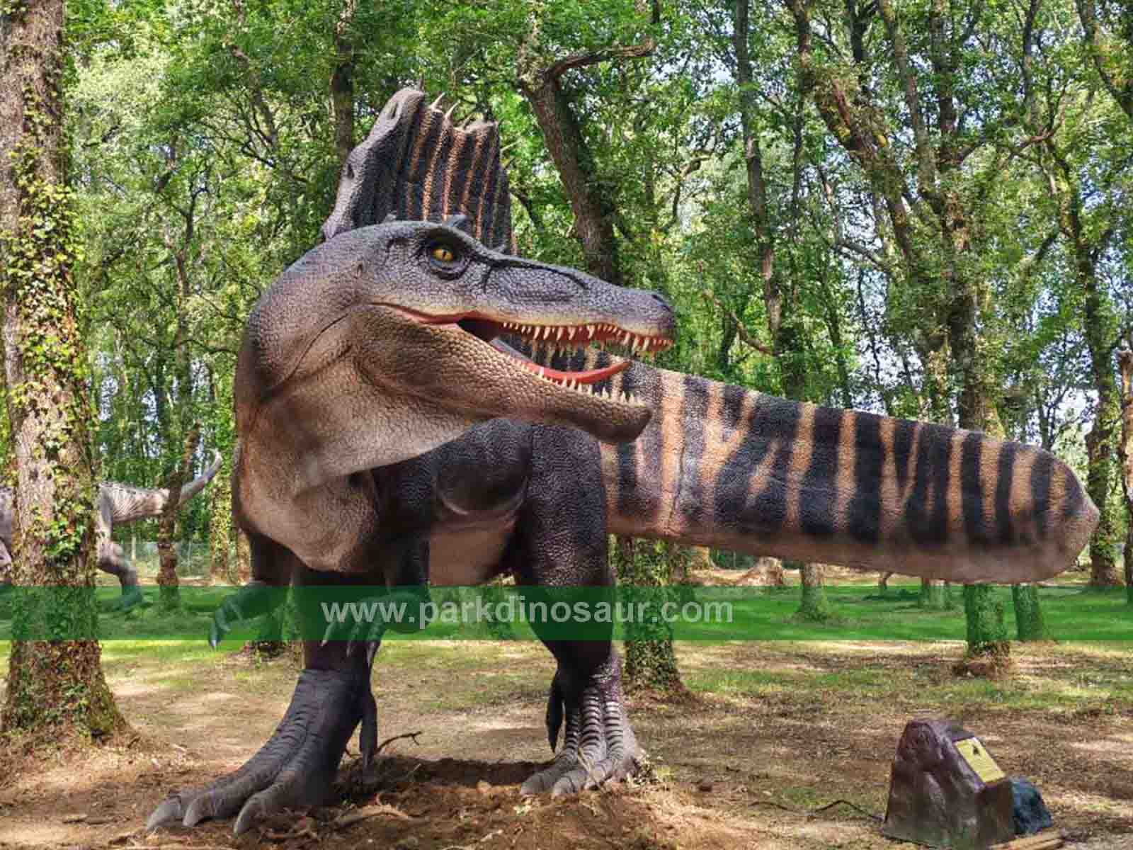 Large Spinosaurus display installed among trees in Lugo Spain