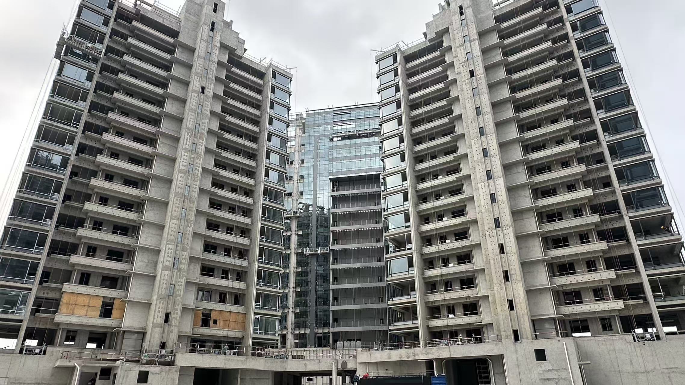 Guangzhou Nansha Building Facade Project Update: Railing Installation Underway After Window Completion