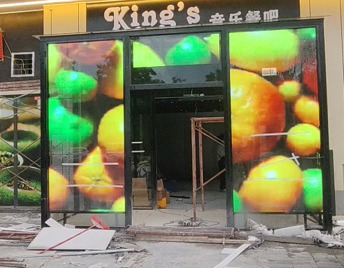 Lino Visino Completes Indoor Transparent Grille LED Screen Installation for a Bar Entrance Advertising Display