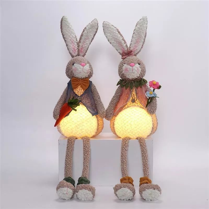 Lapin à pattes pendantes de 84 cm avec lumière chaude