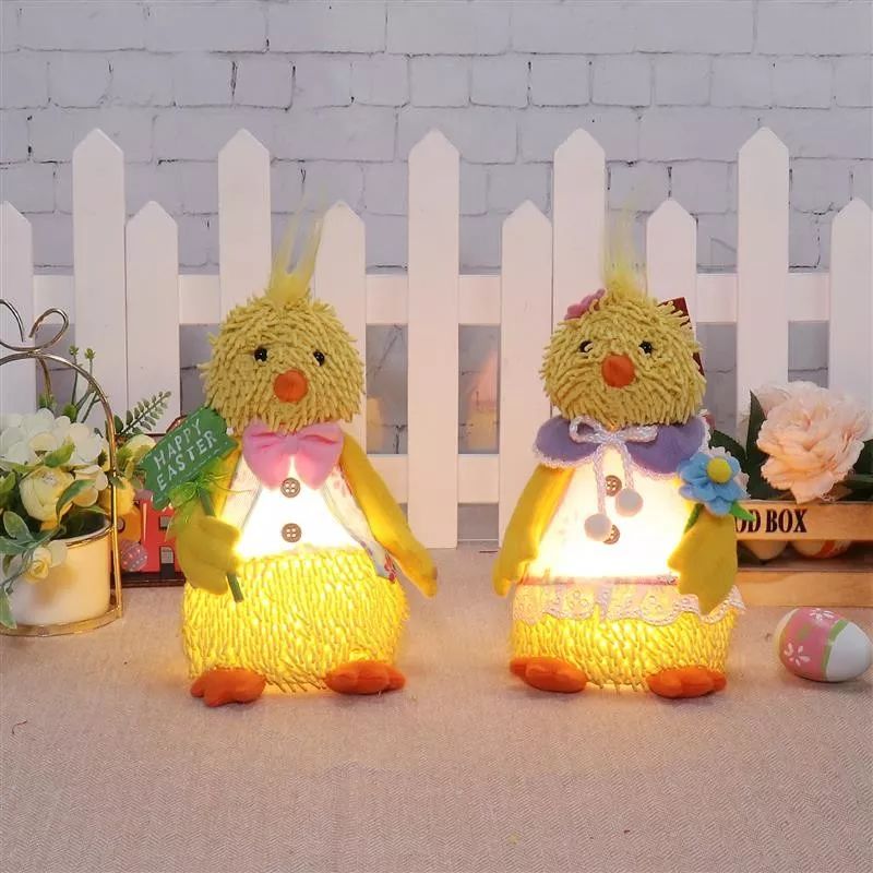Poulet assis de 23 cm avec lumière chaude