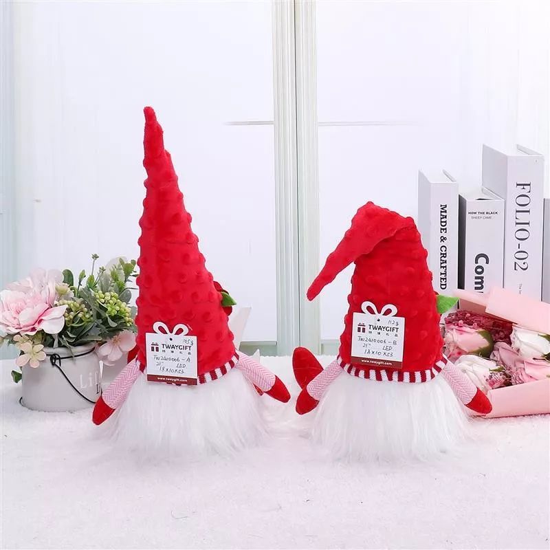 Gnome à jambes pendantes de 53 cm avec lumière chaude