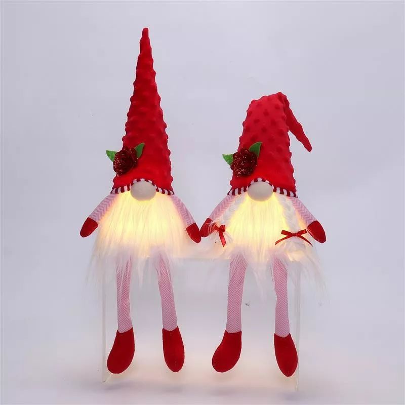 Gnome à jambes pendantes de 53 cm avec lumière chaude