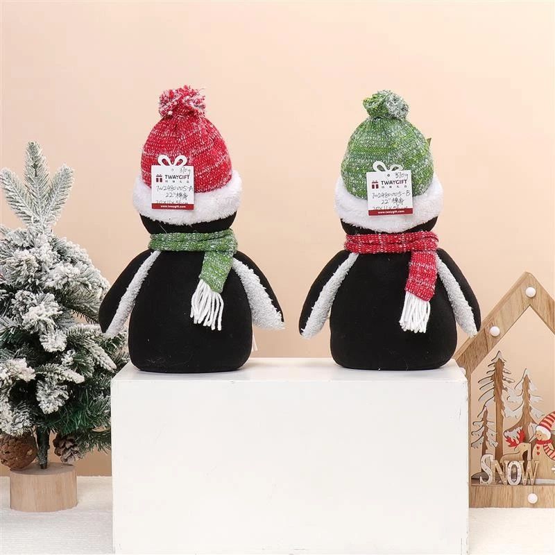 Pingouin à pattes pendantes de 56 cm