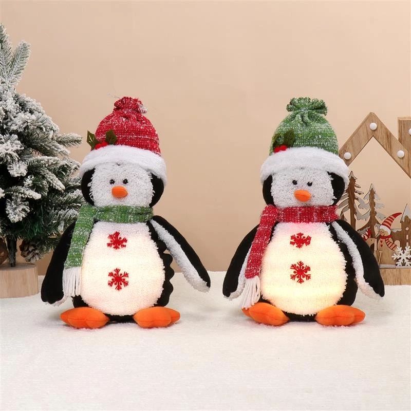 Pingouin assis de 33 cm avec lumière chaude
