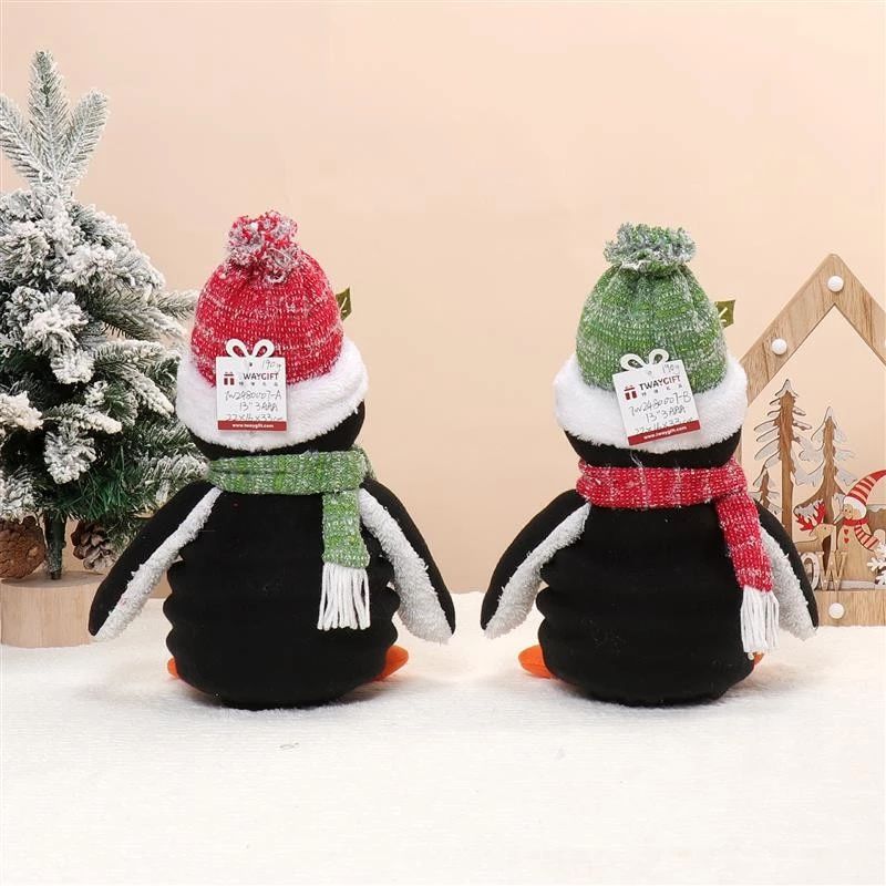 Pingouin assis de 33 cm avec lumière chaude