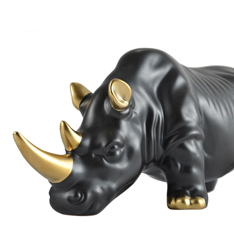Black and Gold Ceramic Rhino Sculptures: Luxurious Animal Figurines for Nourishing Modern Home Decor Accents