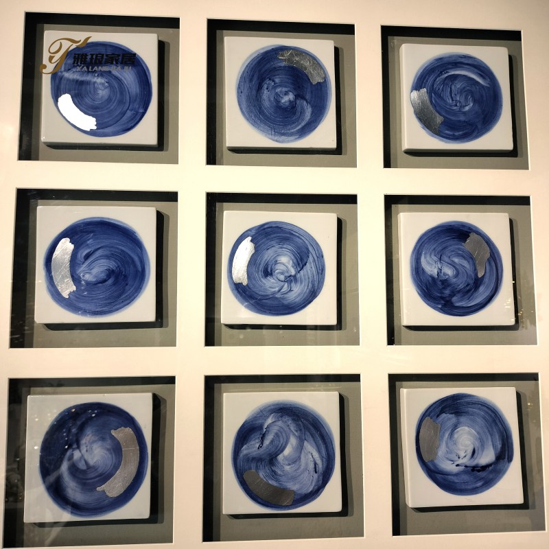 Abstract Blue Swirl Ceramic Wall Art with Metallic Detail - Modern Decor for Stylish Interiors