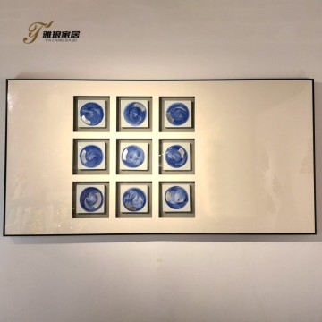 Abstract Blue Swirl Ceramic Wall Art with Metallic Detail - Modern Decor for Stylish Interiors