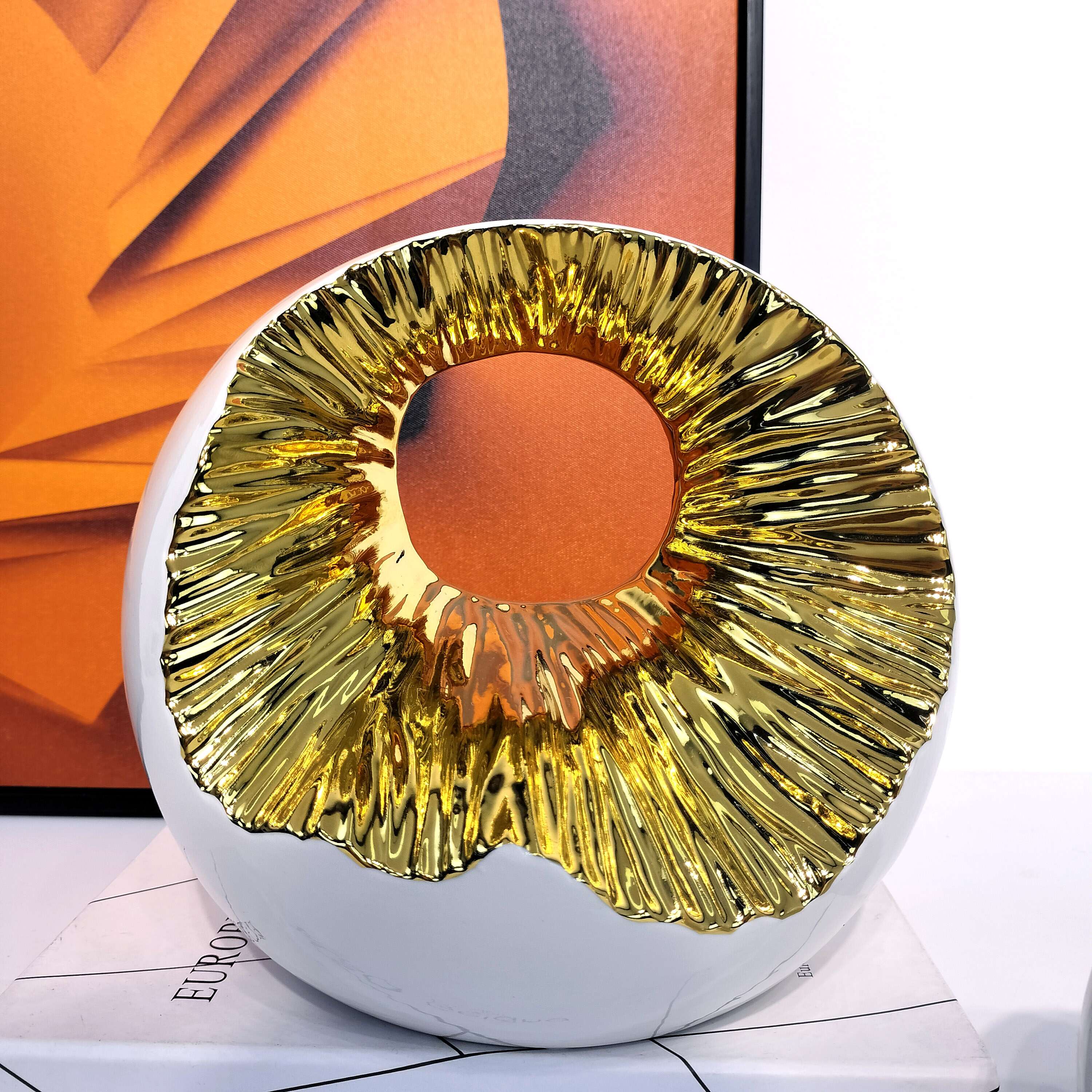 modern-round-hollow-ceramic-sculpture-white-gold-detail