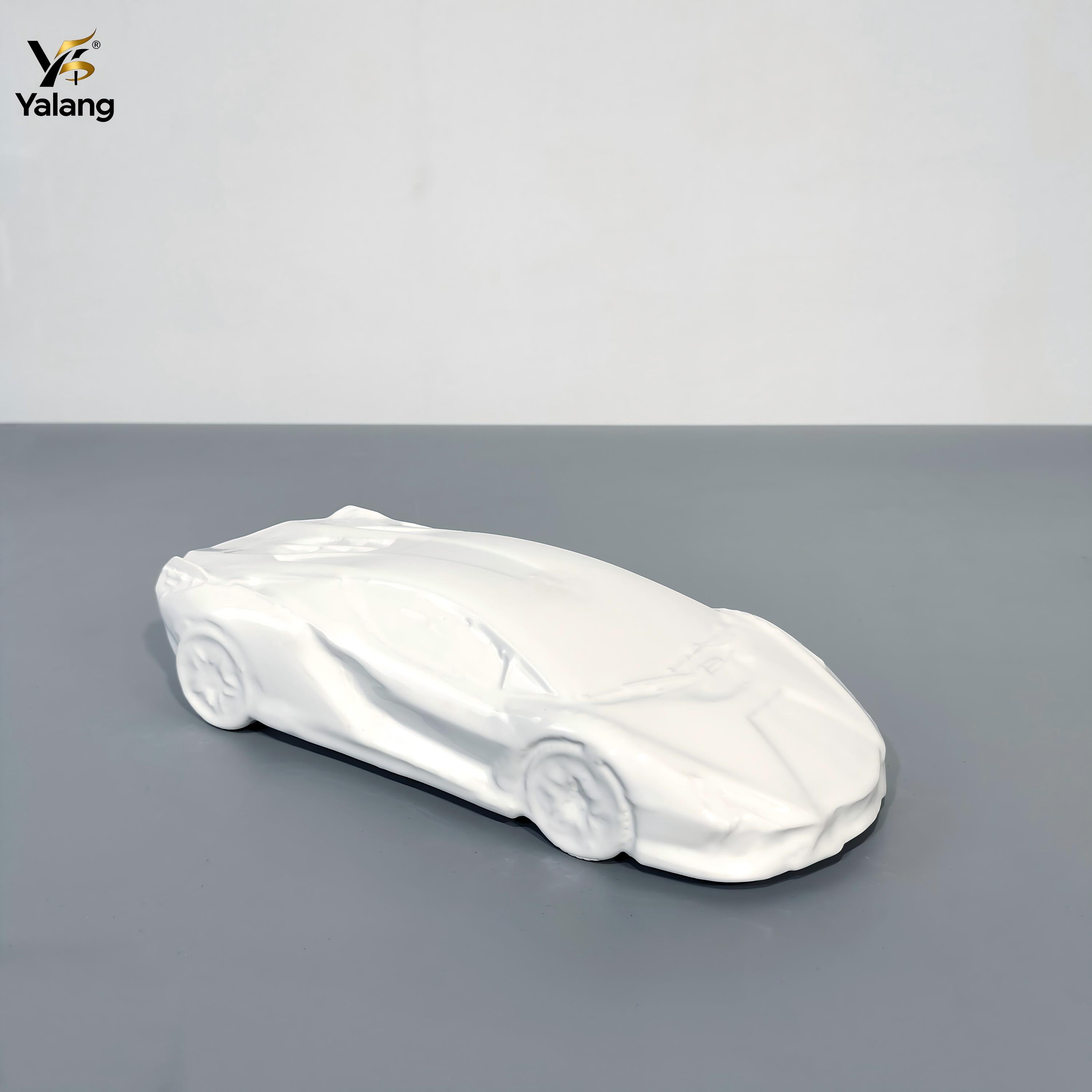 white-porcelain-supercar-sculpture-custom-decor.jpg