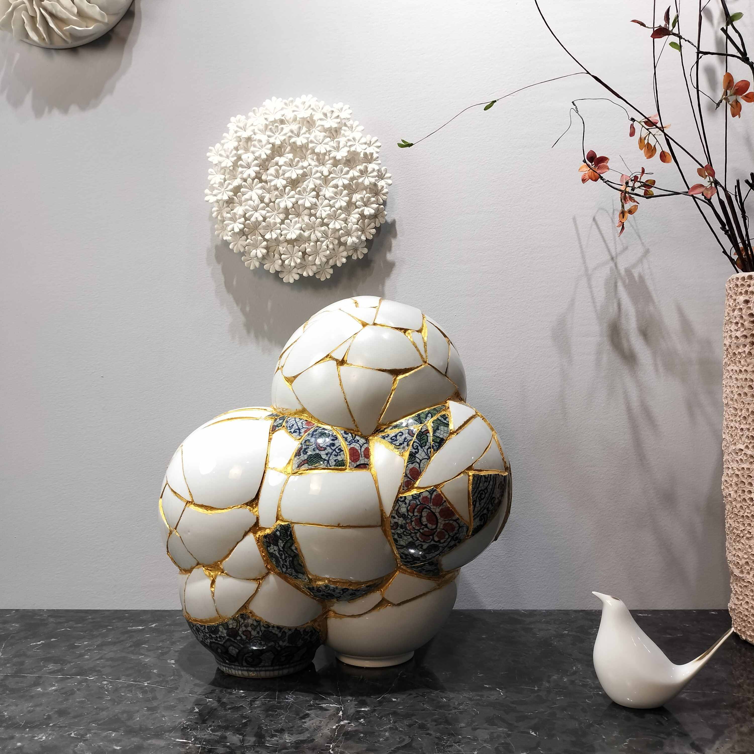hand-gilded-porcelain-fragment-art-sculpture-front-view.jpg