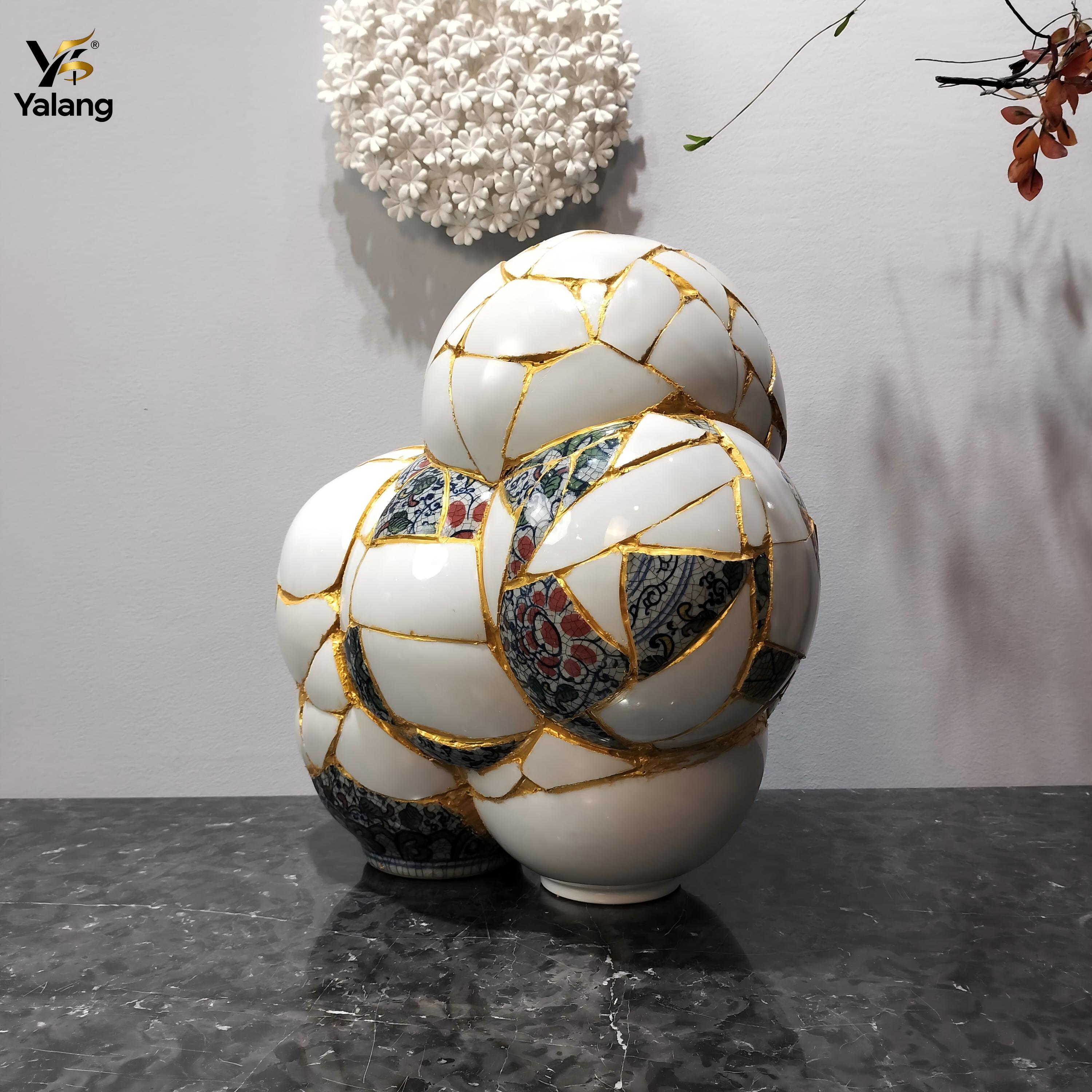hand-painted-gold-seam-blue-and-white-porcelain-close-up.jpg